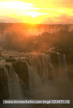 BRAZIL, PARANA: Iguacu Falls,  aerial view of sunset over cluster of falls from Brazilian side.