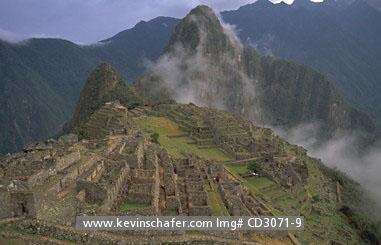PERU, MACHU PICCHU: Peru, Andes Mountains, Inca Ruins on a misty morning above Urubamba Valley.