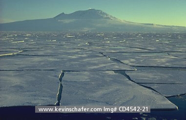 ANTARCTICA: McMurdo Sound and Mount Erebus, view of cracked ice sheets, Ross Island, Antarctica.