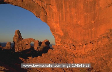 USA, UTAH: Arches National Park  Sunset, view of Turret Arch through North Window.