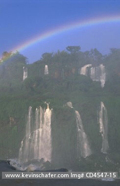 BRAZIL, PARANA, IGUACU FALLS: Brazil, Iguacu National Park, rainbow reaching across top of  Iguacu Falls from  Brazilian side, September.