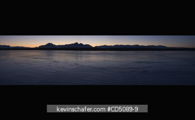 ALASKA: WASILLA, Frozen Lake Lucille, with Chugach Mountains in distance, Winter Dawn. PANORAMIC