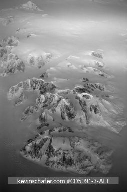 GREENLAND: Winter aerial of mountain range in Greenland, black and white, digital file, small usages only.
