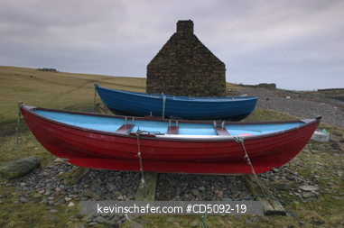 SCOTLAND, SHETLAND ISLANDS: SHETLAND, Traditional fishing boast along shore.