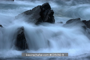 SCOTLAND, SHETLAND ISLANDS: Surf breaking on rocky shore, Dusk, Sumburgh Head, South Mainland, Shetland