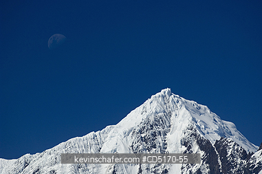 SOUTH GEORGIA ISLAND: Moon over mountainside, Allardyce Range, South Georgia Island, South Atlantic Ocean