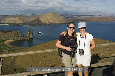 GALAPAGOS: Tourists atop Bartolome Island, GALAPAGOS, Ecuador.