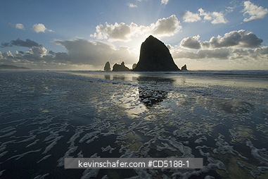 OREGON, US: Sunset over Haystack Rock, Cannon Beach OREGON COAST Oregon USA