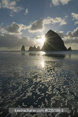 OREGON, USA: Sunset over Haystack Rock, Cannon Beach OREGON COAST Oregon USA