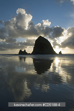 OREGON, US: Sunset over Haystack Rock, Cannon Beach OREGON COAST Oregon USA
