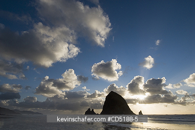 OREGON, US: Sunset over Haystack Rock, Cannon Beach OREGON COAST Oregon USA