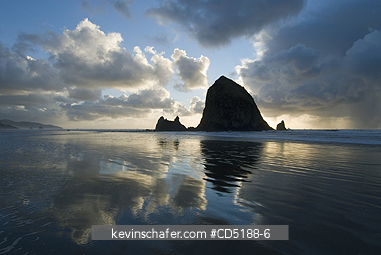OREGON, US: Sunset over Haystack Rock, Cannon Beach OREGON COAST Oregon USA