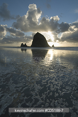 OREGON, US: Sunset over Haystack Rock, Cannon Beach OREGON COAST Oregon USA