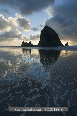 OREGON, US: Sunset over Haystack Rock, Cannon Beach OREGON COAST Oregon USA