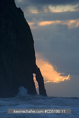 OREGON, USA: Haystack Rock and arch at sunset, Cape Kiwanda, Oregon Coast