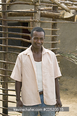 MADAGASCAR: Man shows house he is building, near Moramanga, Eastern Madagascar