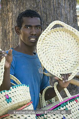 MADAGASCAR: Man selling baskets, Mahajanga, Western Madagascar