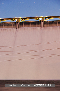 WASHINGTON, COULEE DAM: Spillway, water flows over Grand Coulee Dam, Washington.