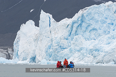 NORWAY, SVALBARD: Zodiac takes travelers along glacier front, Monaco Glacier, Leifdefjord, Svalbard, Norway