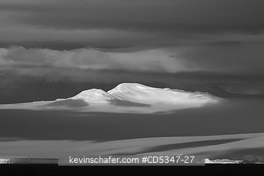ANTARCTICA: Snowy peaks, Black Skies, Antarctic Peninsula