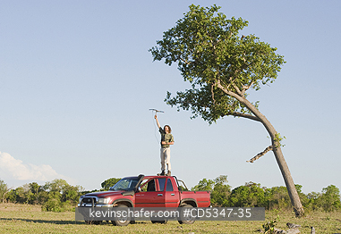 BRAZIL, PEOPLE: Biologist Arnaud Desbiez tracking Giant Armadillos, PANTANAL, Brazil