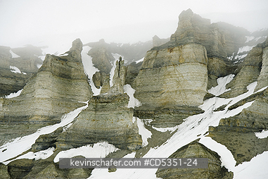NORWAY, SVALBARD: Sedimentary cliffs in fog, Vaigattbogen, Svalbard, Norway