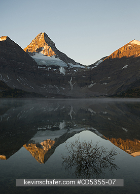 CANADA, BRITISH COLUMBIA: Dawn on Mt. Assiniboine reflected in Lake Magog, Mt. Assiniboine Provincial Park, British Columbia, Canada SEPTEMBER