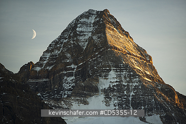 CANADA, BRITISH COLUMBIA: Crescent Moon and summit of Mt. Assiniboine, Mt. Assiniboine Provincial Park, British Columbia, Canada 