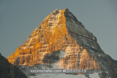 CANADA, BRITISH COLUMBIA: Sunrise on Mt. Assiniboine from Magog Lake, Mt. Assiniboine Provincial Park, British Columbia, Canada SEPTEMBER