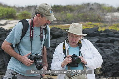 GALAPAGOS, TOURISM: Jack Swenson, photo instructor with guest, Galapagos.