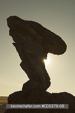 IDAHO, SCENIC: Balanced Rock, free-standing basalt tower near Twin Falls, Idaho, SUNSET