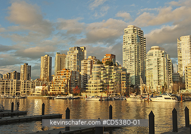 CANADA, VANCOUVER: Sunset on Yaletown district across False Creek from Granville island, Vancouver, BC Canada