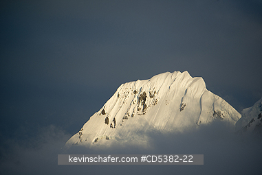 ANTARCTICA, SCENIC: Mountains and Mist at sunset above Lemaire Channel, Antarctic Peninsula, Antarctica