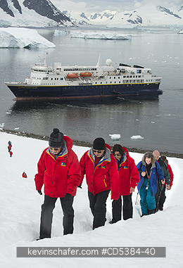 ANTARCTICA, PEOPLE: Guests climbing Danco island, Antarctica