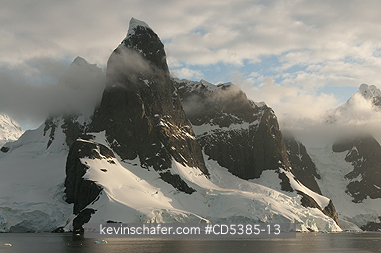 ANTARCTICA, SCENIC: Sunset on peaks of Lemaire Channel, Antarctic Peninsula, Antarctica
