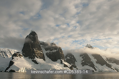 ANTARCTIC, SCENIC: Sunset on peaks of Lemaire Channel, Antarctic Peninsula, Antarctica