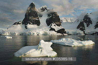 ANTARCTIC, SCENIC: Sunset on peaks of Lemaire Channel, Antarctic Peninsula, Antarctica