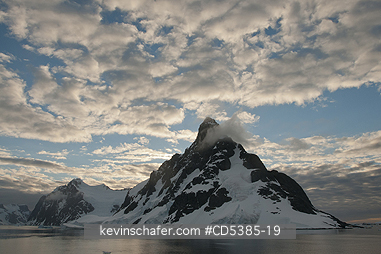 ANTARCTICA, SCENIC: Sunset on peaks of Lemaire Channel, Antarctic Peninsula, Antarctica