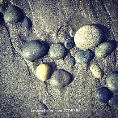 CANADA. SCENIC: Beach rocks and sand, Victoria BC  MOBILE PHONE