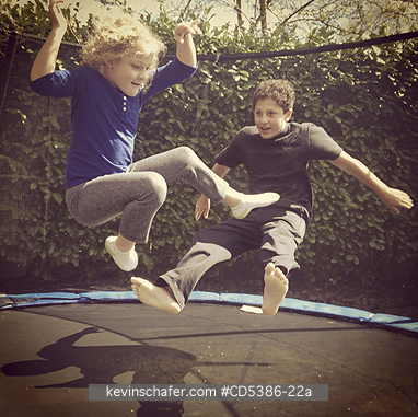 CHILDREN: Theo and Maya Braibish, playing on trampoline (MOBILE PHONE)
