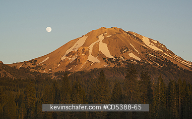 CALIFORNIA, SCENIC: Full moon rising over Mt. Lassen, 10,463\\\'. Taken from Manzanita Lake at sunset,  Lassen Volcanic National Park, California