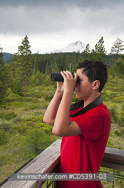 OREGON, PEOPLE: Theo Braibish, aged 12, Mt. Hood from Five Mile Butte Lookout tower, elevation 11,250\\\' (3,429 m)