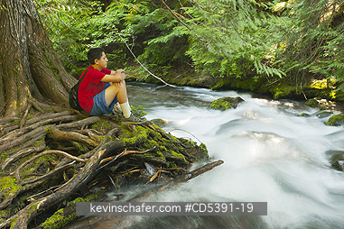 OREGON, PEOPLE: Theo Braibish, aged 12, along Tamanawas stream, Mt. Hood National Forest, Oregon MR