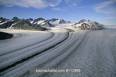 ALASKA, GLACIER BAY: Glacier Bay National Park, east arm, aerial of Casement Glacier, medial moraines.