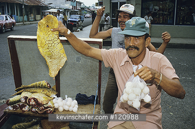 COSTA RICA: Costa Rica, Limon, Caribbean coast, Man selling meat and eggs of endangered Green Sea Turtle.