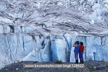USA, ALASKA: Glacier Bay National Park, hikers and Alsek Glacier MR
