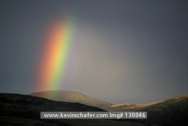 ARGENTINA: Argentina, Tierra del Fuego, near Ushuaia, Beagle Channel, Rainbow at sunset. Patagonia