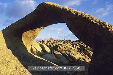 CALIFORNIA, SIERRA NEVADA: USA, California, Alabama Hills, Eastern Sierra Nevada Mountains, Granite arch and rocks at dawn.
