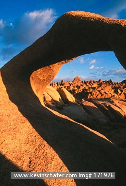 CALIFORNIA, SIERRA NEVADA: USA, California, Alabama Hills, Eastern Sierra Nevada Mountains, Granite arch and rocks at dawn.