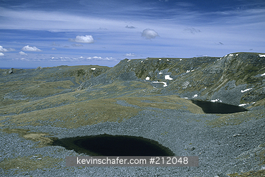 FALKLAND ISLANDS: Falkland Islands, East Falkland, Mt. Usborne, Highest peak, Glacially carved tarns below broad cirque.